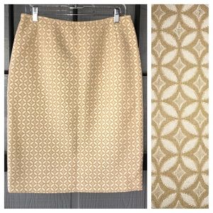 Le Suit pencil skirt, thick material with all over pattern, golden tan colored